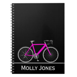 Cuaderno Bicicleta rosa neón con nombre en negro