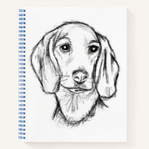 Cuaderno boceto de perro salchicha dibujado a mano en negro