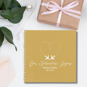 Cuaderno Boda dorada y blanca, dos aviones forman un corazó