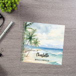 Cuaderno Boda en la playa de Bridesmaid<br><div class="desc">Una playa tropical,  con olas y palmeras,  de color acuático. Personalice y agregue el nombre de su dama de honor. Guión de estilo manuscrito negro.</div>