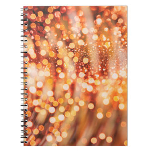 Cuaderno Bokeh natural y luces doradas brillantes