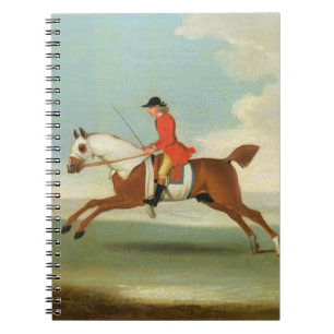 Cuaderno Caballo de carreras galopante y jinete montado en