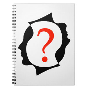 Cuaderno cabezas con un signo de interrogación