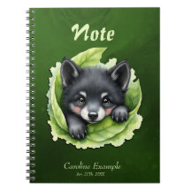 Cachorro de lobo en el verde