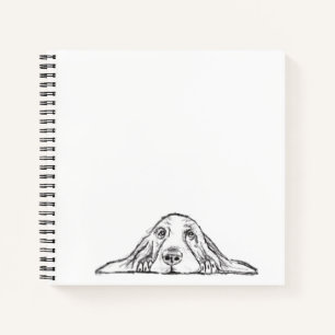 Cuaderno cachorro de ojos de perro de raza basset hound neg