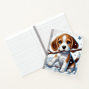 Cuaderno Cachorro jugando en la nieve con palo en invierno