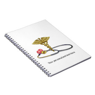 Cuaderno Caduceo médico de oro y estetoscopio con corazón