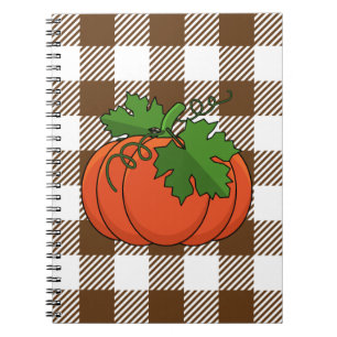 Cuaderno Calabaza naranja sobre patrón de cuadros marrones