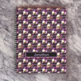 Cuaderno Calaveras y flores moradas sobre el fondo del arle