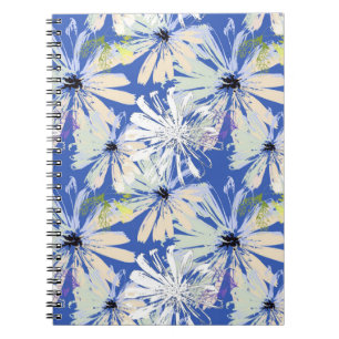 Cuaderno Cámaras abstractas en un fondo azul.