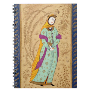 Cuaderno Chica que sostiene un buque del vino y una pera,