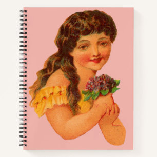 Cuaderno Chica victoriano sostiene violetas