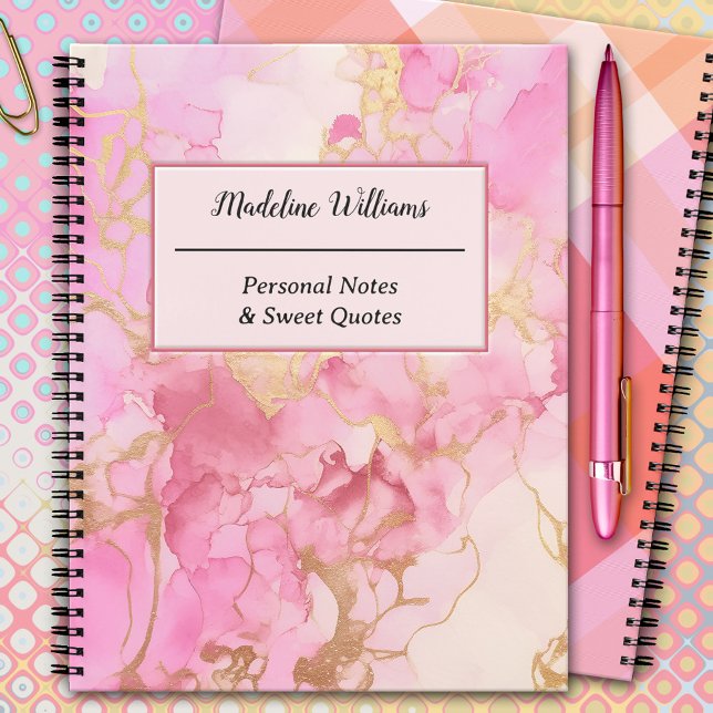 Cuaderno Citas artísticas de mármol rosa (Notebook featuring a pink and gold marble design on the front and pink orange plaid on the back)