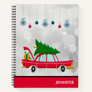 Cuaderno Coche rojo retro que lleva un árbol de Navidad