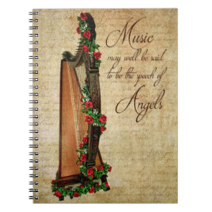 Cuaderno color de rosa irlandés de la arpa