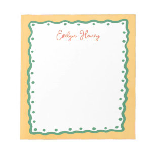 Cuaderno con borde ondulado de colores vibrantes y