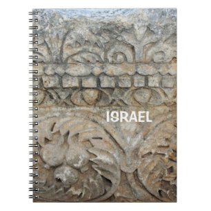 Cuaderno con muro de piedra en Israel