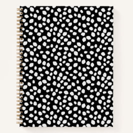 Cuaderno con patrón de manchas en blanco y negro