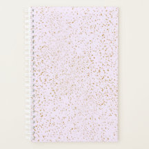 Cuaderno con salpicaduras de rosa y dorado