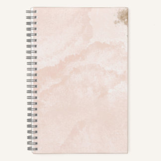 Cuaderno con salpicaduras marrones y bronceadas
