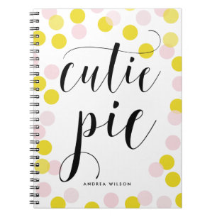 Cuaderno Confetti rosado y amarillo con caligrafía cúbica