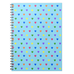 Cuaderno Corazones de polka arcoiris sobre azul bebé