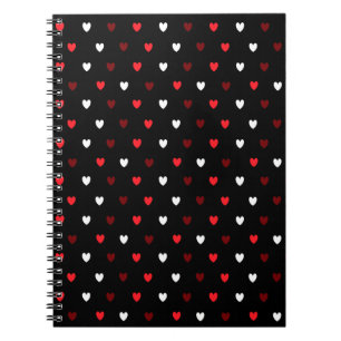 Cuaderno corazones rojos y blancos sobre negro
