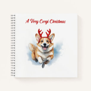 Cuaderno Corgi de Navidad con cuernos de reno saltando 