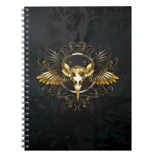 Cuaderno Cráneo de pájaro dorado sobre fondo negro