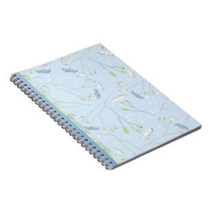 Cuaderno Daisies blancos azules de bonito con una vegetació