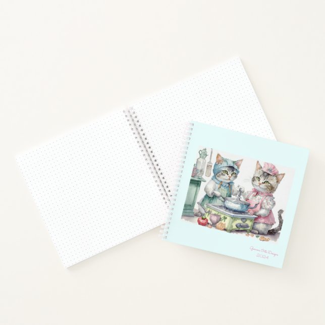 Cuaderno de apuntes de gatos en la cocina con viñe (Interior)