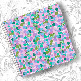 Cuaderno de arte de rana con fondo rosa