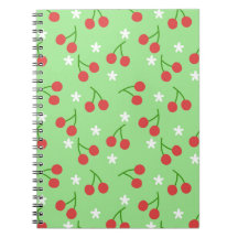 Cuaderno de cerezas y flores blancas