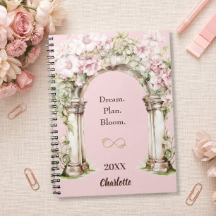 Cuaderno de citas inspiradoras con flores rosadas