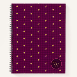 Cuaderno de cuadros con acento dorado