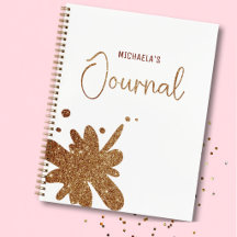 Cuaderno de diario con salpicaduras de purpurina d