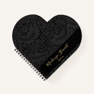 Cuaderno de dibujo con patrón floral negro