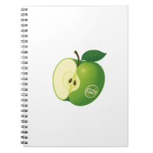Cuaderno de fotos en espiral con una manzana verde