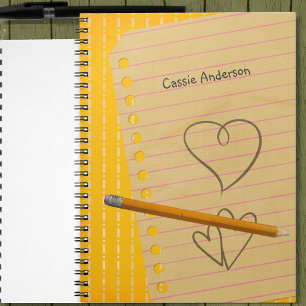 Cuaderno de lápiz naranja y garabatos