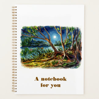 Cuaderno de noche a la luz de la luna