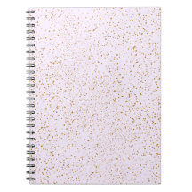 Cuaderno de notas con destellos rosados y dorados