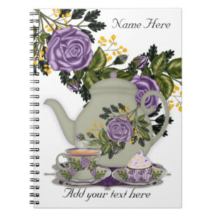 Cuaderno de notas con té, magdalenas y rosas