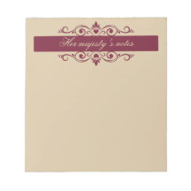 Cuaderno de notas dorado con remolinos florales de
