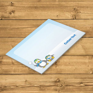 Cuaderno de pingüinos lanzando bolas de nieve