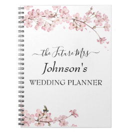 Cuaderno de planeamiento de bodas con flores de ce
