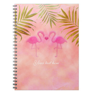 Cuaderno de playa tropical con dos flamencos rosad