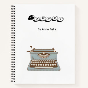 Cuaderno de poesía con máquina de escribir y perso