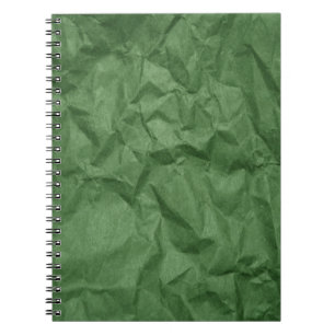 Cuaderno de texto de papel verde arruinado