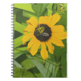 Cuaderno Descanso en un portátil de fotos de flores
