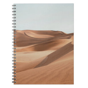 CUADERNO DESIERTO BAJO CIELO AZUL CLARO DURANTE EL DÍA